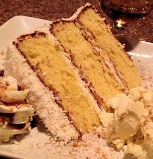 Chef Tyson Amick serves this coconut cake at Aubriana's, his Wilmington restaurant. A native of Eastern North Carolina, Amick has made the cake, which has a long family pedigree, a staple on the menu.