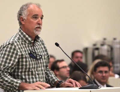 Jay Styron, an oysterman from Cedar Island, argues that his business depends on clean water. Photo: Kirk Ross