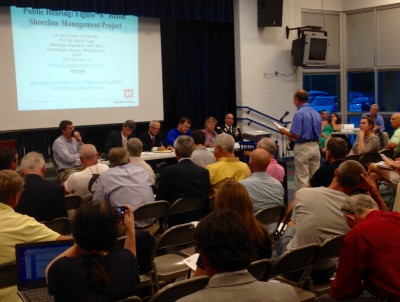 Mike Giles, coastal advocate with the N.C. Coastal Federation, speaks during a public hearing on Figure Eight Island’s proposed terminal groin held Sept. 2. About 100 area residents attended, all spoke against the plan. Photo: Dana Sargent