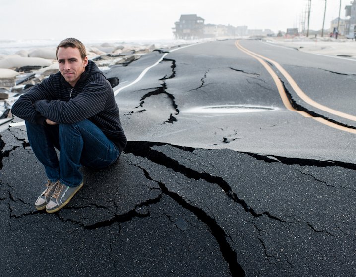 Professional surfer and native, Brett Barely, surveys the damage of his home and playground after Hurricane Sandy.