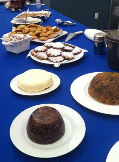 Karen Moshoures sets out colonial dishes at the Museum of Coastal Carolina in Ocean Isle Beach. Photo: Allison Ballard