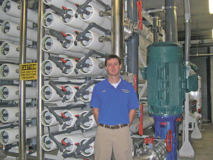 Seola Hill is pictured in the new Bogue Banks Water Corp. reverse osmosis water plant, which is fully automated. Photo: Brad Rich