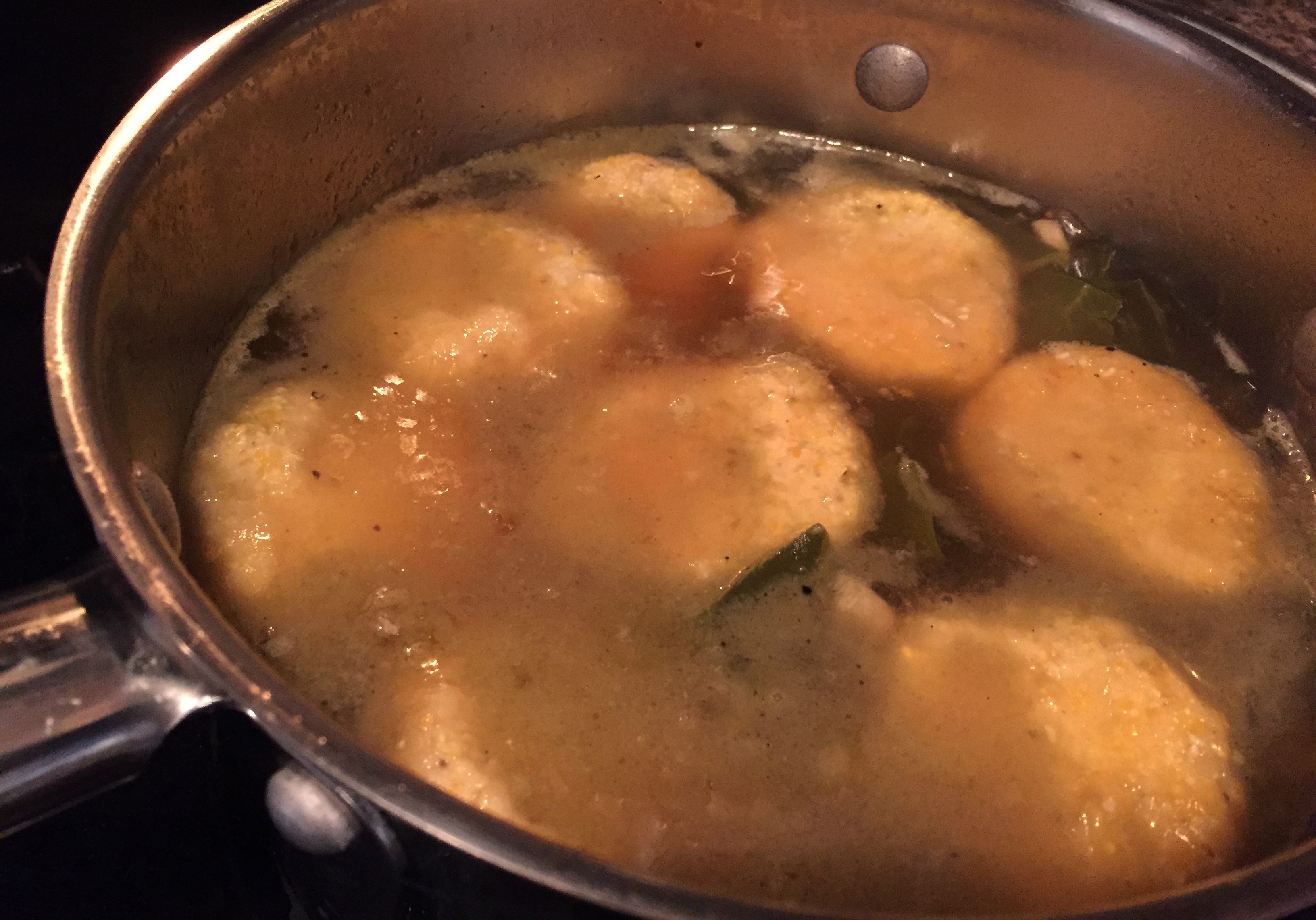 Let the dumplings simmer oh so gently. Do not stir. They'll sink a little, and that's OK. How do you know when they're done? Practice and experience. Make a few extra so that you may taste along the way. Check them at the 20-minute mark. Photo: Liz Biro