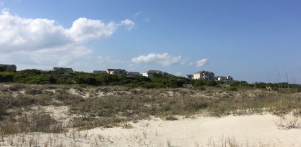 This is about where Holden Beach's proposed terminal groin would be anchored. Homes nestled in Dunescape, a gated neighborhood on the far eastern end of Holden Beach, stand in the background, including the home of Ronda Dixon.Dixon's property is one of two lots the proposed structure may cross.