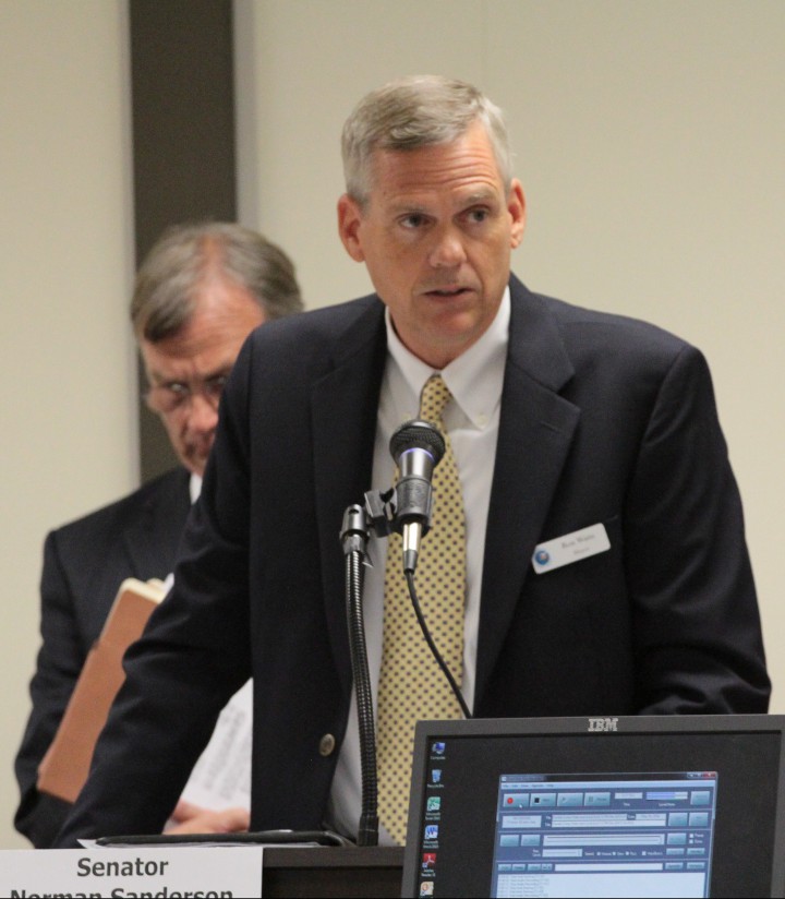 Sunset Beach Mayor Ron Watts tells the committee the town is committed to resolving differences with developers. Photo: Kirk Ross