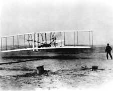 A crew member of the life saving station took this photo of the Wright Brothers' first flight. Library of Congress image enhanced by Joyner Library, East Carolina University.