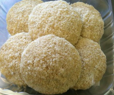 Crab cakes at Pelican Seafood are formed from fresh, unpasteurized North Carolina blue crab meat shaped into an inch-thick, burger-size cake with a light coating of Panko bread crumbs. Photo: Liz Biro