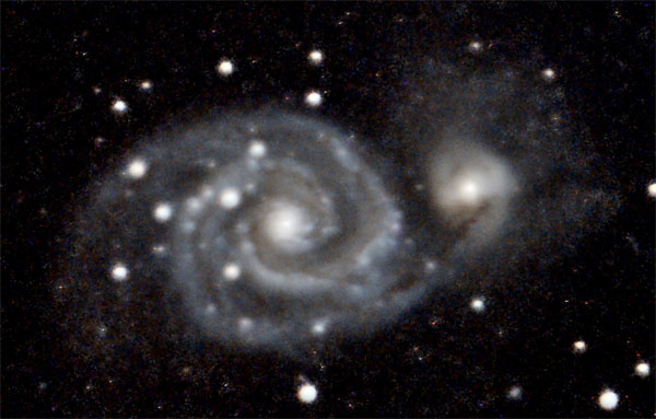 M51 is about 23 million light years away. The smaller galaxy on the right is NGC 5195. It’s often called M51B. And yes, there is some sort of interaction going on between the two. Photo: Gerry Lebing