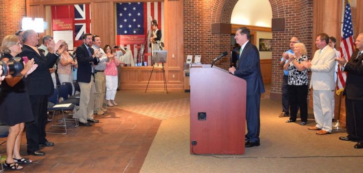 Attendees applaud as Gov. Roy Cooper's announces Thursday that his opposition to oil and gas drilling and exploration off the North Carolina coast. Photo: Mark Hibbs