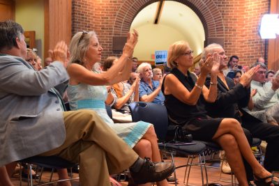 Attendees applaud Gov. Roy Cooper's announcement Thursday at Fort Macon State Park that he would lead the fight against offshore drilling. Photo: Mark Hibbs